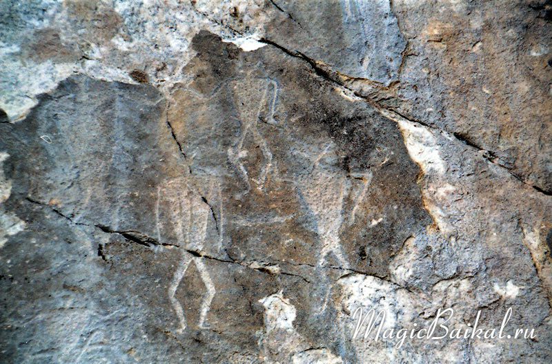 Ancient rock paintings on Sagan-Zaba cliff